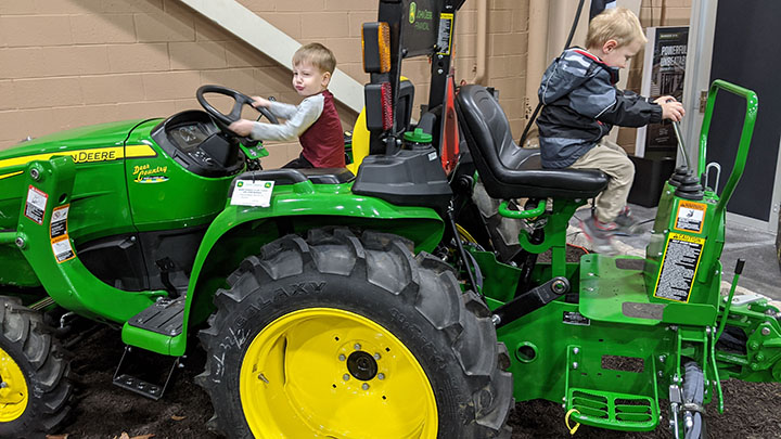 Image: Two boys on a tractor