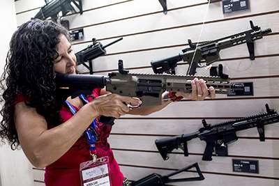 woman at a gun show