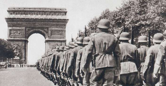 World War II German troops marching through Paris