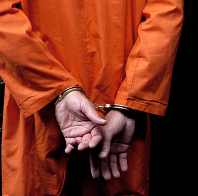 prisoner in cuffs